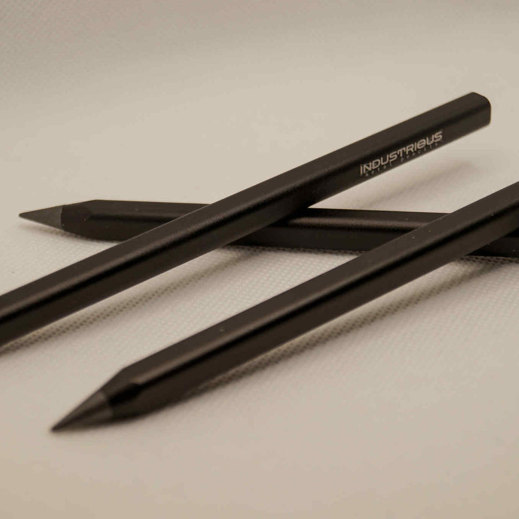 Metal pencil with extra graphite tips