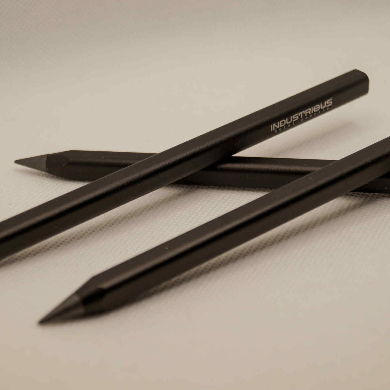 Metal pencil with extra graphite tips
