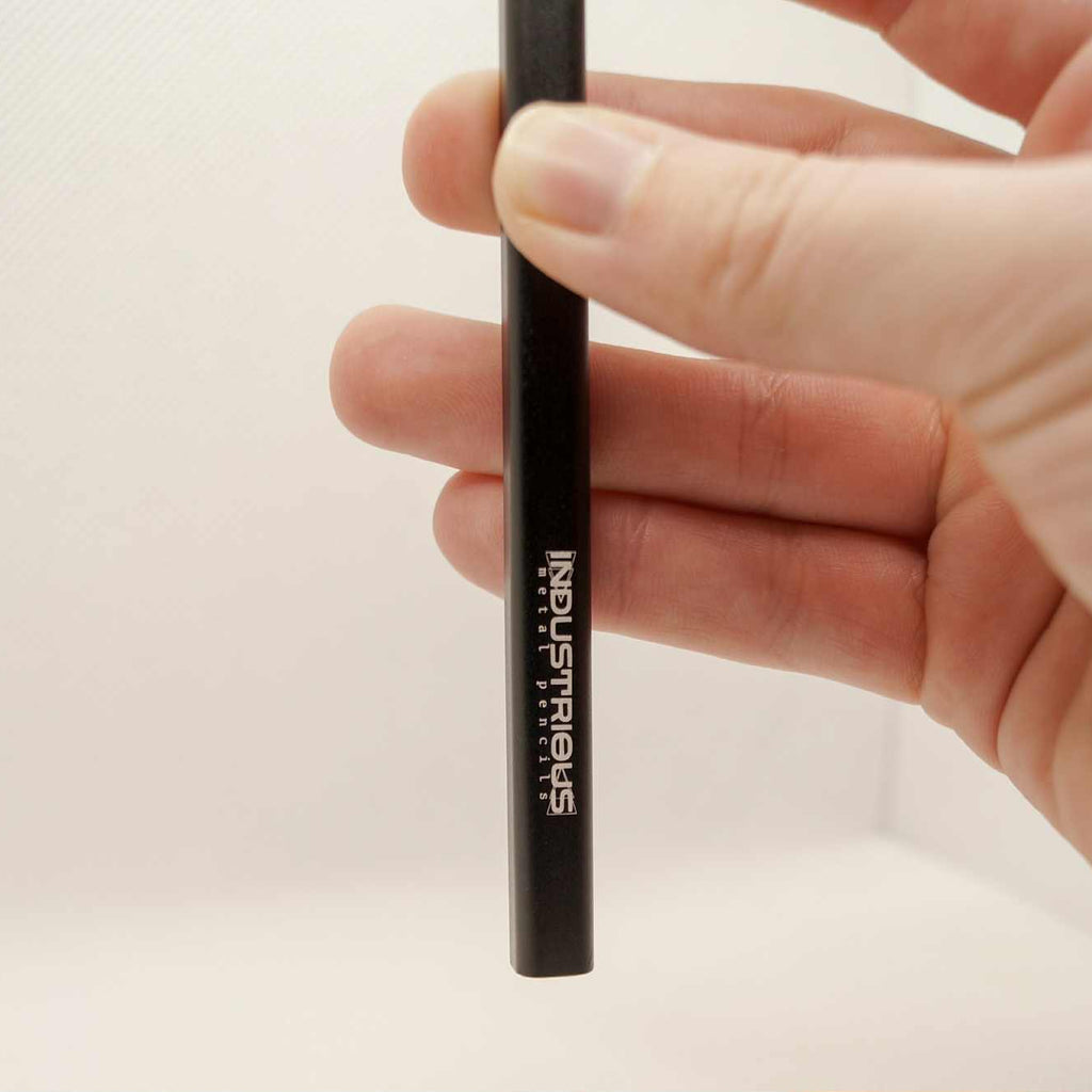 Metal pencil with extra graphite tips